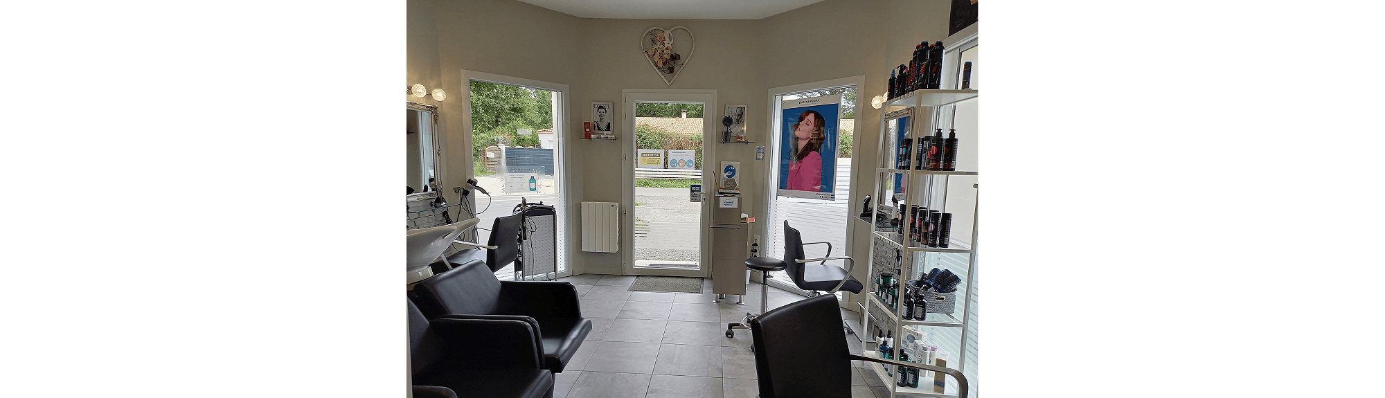 woman in red long sleeve shirt holding hair blower